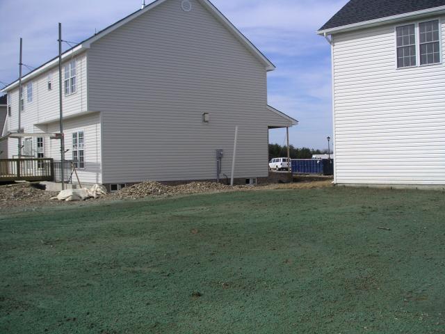 View from middle of back yard, next door neighbor, yay no windows looking at us