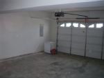 Garage, LOTS of storage space just to left of pictures, garage door opener already there, not sure whose dishwasher that is