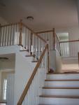 Looking up from foyer into second floor landing