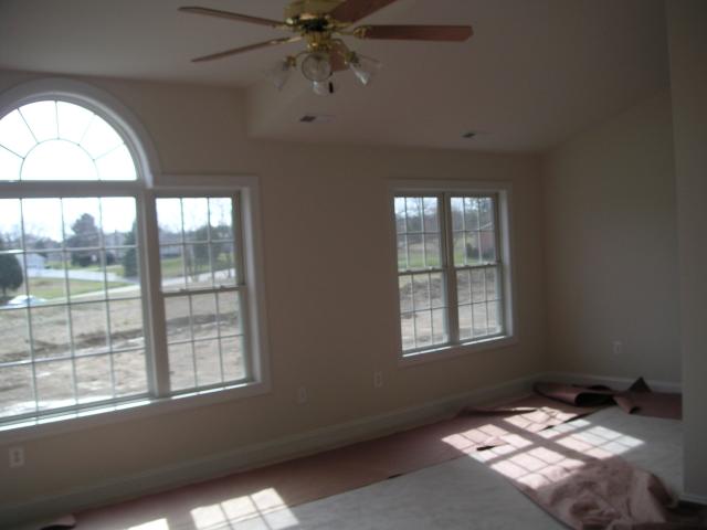 Looking from corner of master bedroom through room and sitting room