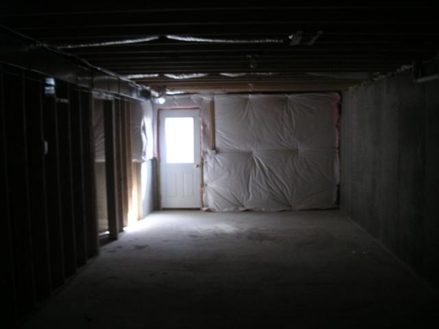 Other long room in basement with walk-out behind