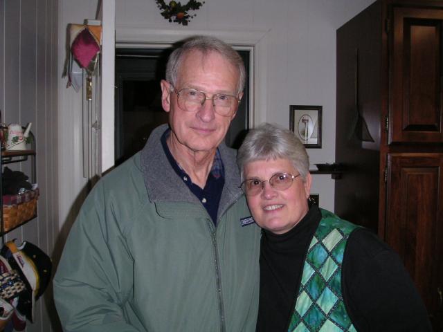 My mom and step dad posing for their picture