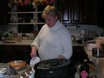 My sister making sure the left overs are distributed... wish I still had some of that food, it was sooooo good!